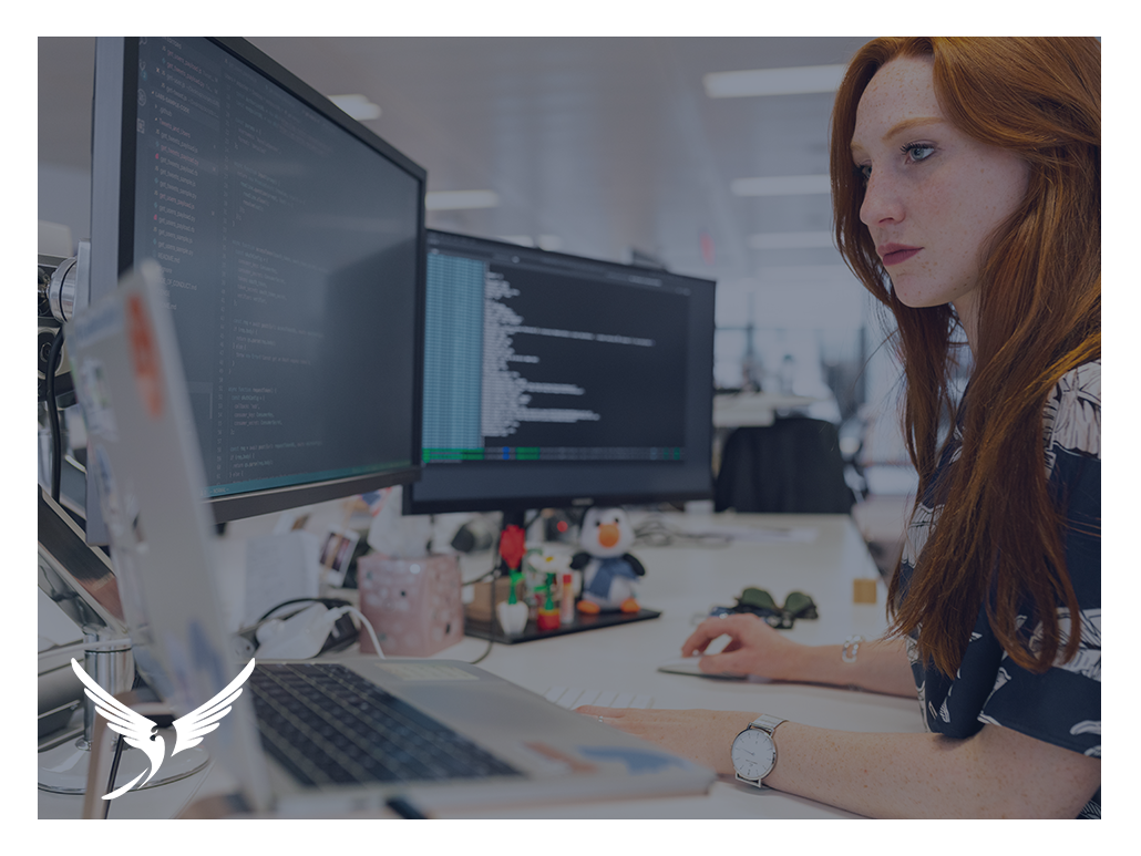 Woman working at a busy desk